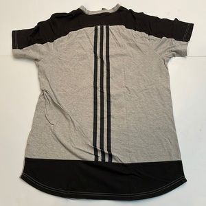 Back of a print straight Adidas T-shirt size large curved hem